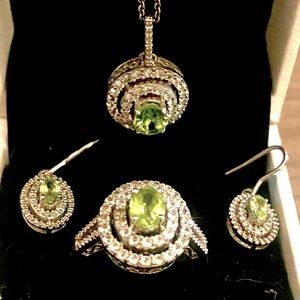 Necklace, earring, & ring set. Diamond & peridot plated in white gold.